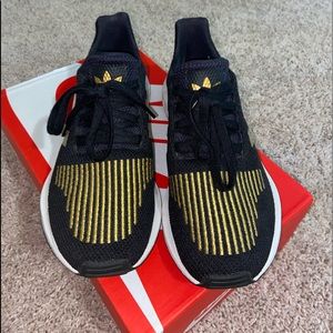 Black and Gold Adidas Sneakers